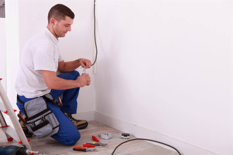 electrician measuring wire